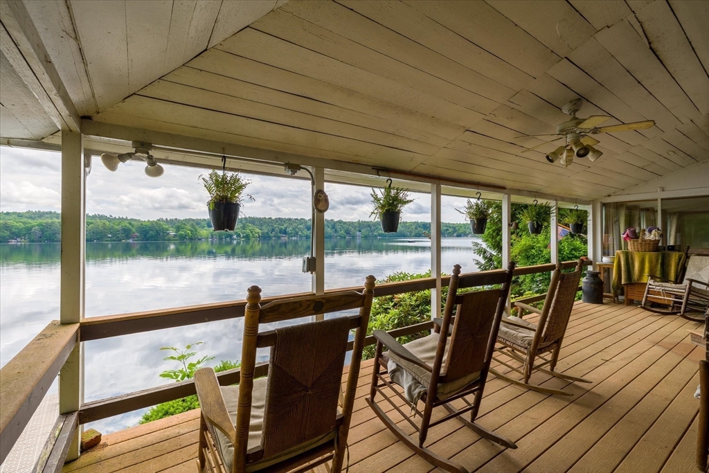 35 Mt Dan Road Sturbridge, MA 01518 - Photo 7 of 37 a view of a porch with furniture and wooden floor