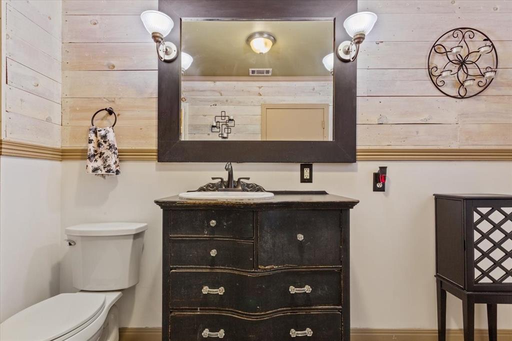 3015 Sturgis Lane Waco, TX 76708 - Photo 21 of 40 a bathroom with a sink vanity and a mirror