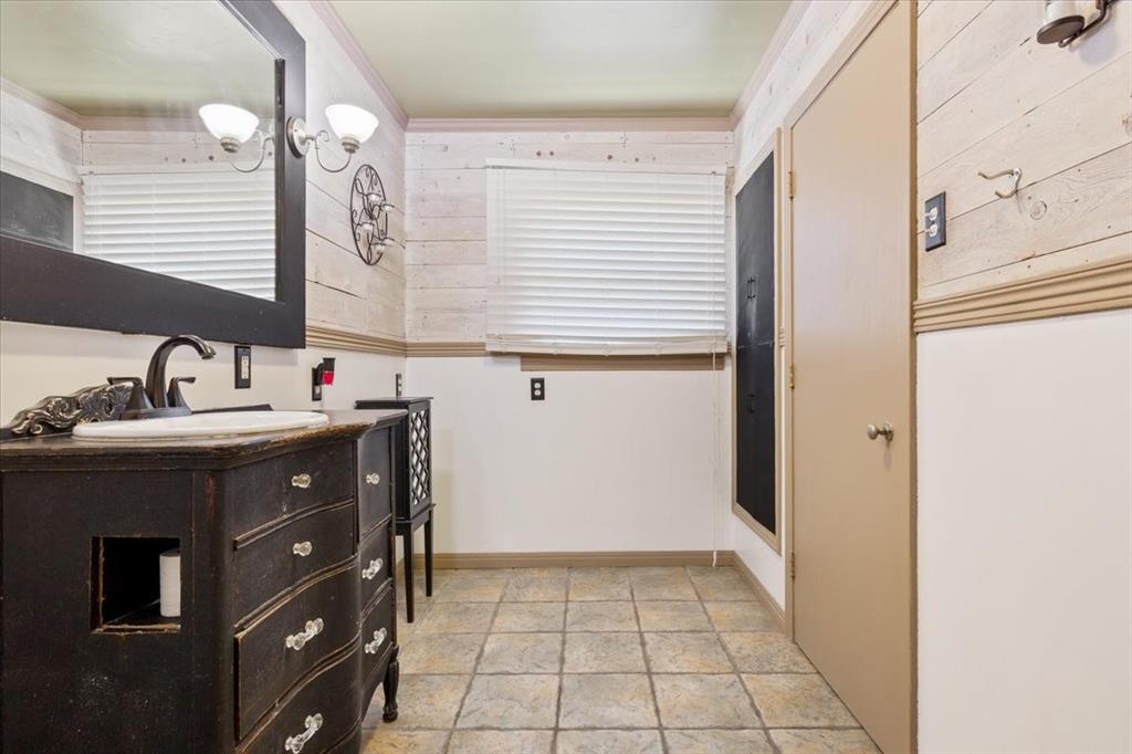 3015 Sturgis Lane Waco, TX 76708 - Photo 23 of 40 a bathroom with a sink vanity and a mirror