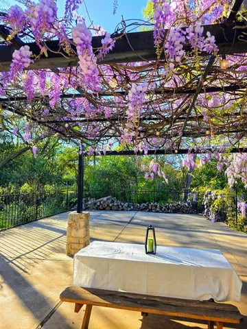 a view of swimming pool with flowers