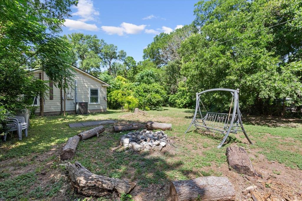 3015 Sturgis Lane Waco, TX 76708 - Photo 39 of 40 a backyard of a house with lots of green space