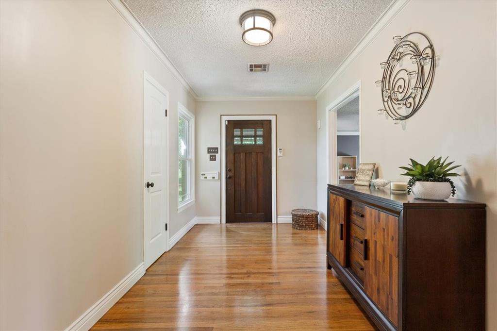 3015 Sturgis Lane Waco, TX 76708 - Photo 5 of 40 a hallway with wooden floor