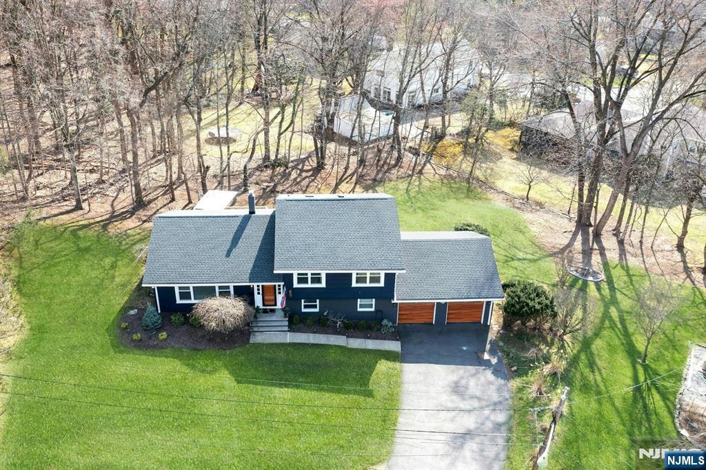 108 Hendrickson Street Haworth, NJ 07641 - Photo 1 of 38 a view of house with a yard