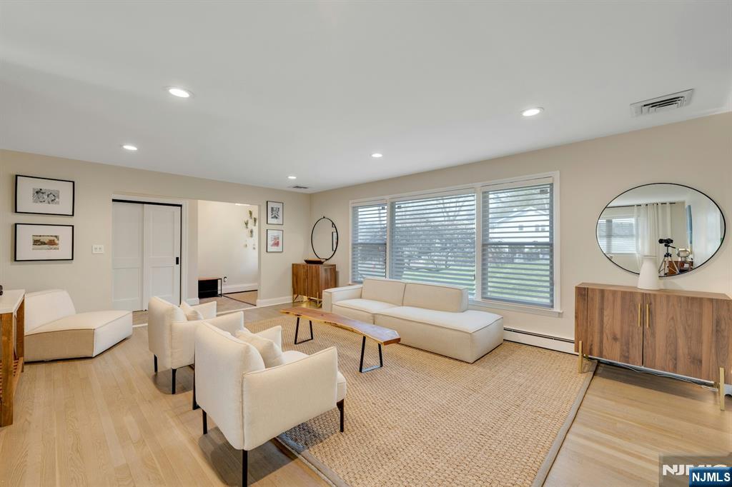 108 Hendrickson Street Haworth, NJ 07641 - Photo 12 of 38 a living room with furniture and a window