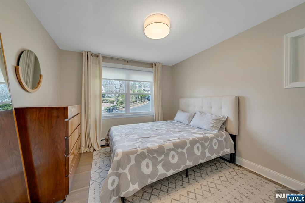 108 Hendrickson Street Haworth, NJ 07641 - Photo 20 of 38 a bedroom with a bed and a window