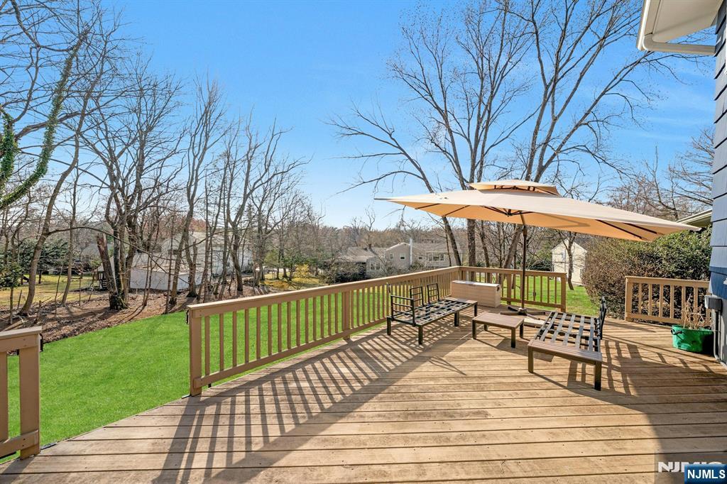 108 Hendrickson Street Haworth, NJ 07641 - Photo 30 of 38 a view of a deck with wooden floor and outdoor space