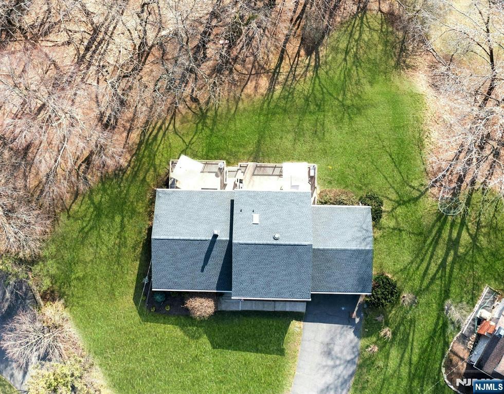 108 Hendrickson Street Haworth, NJ 07641 - Photo 34 of 38 an aerial view of a house with a yard