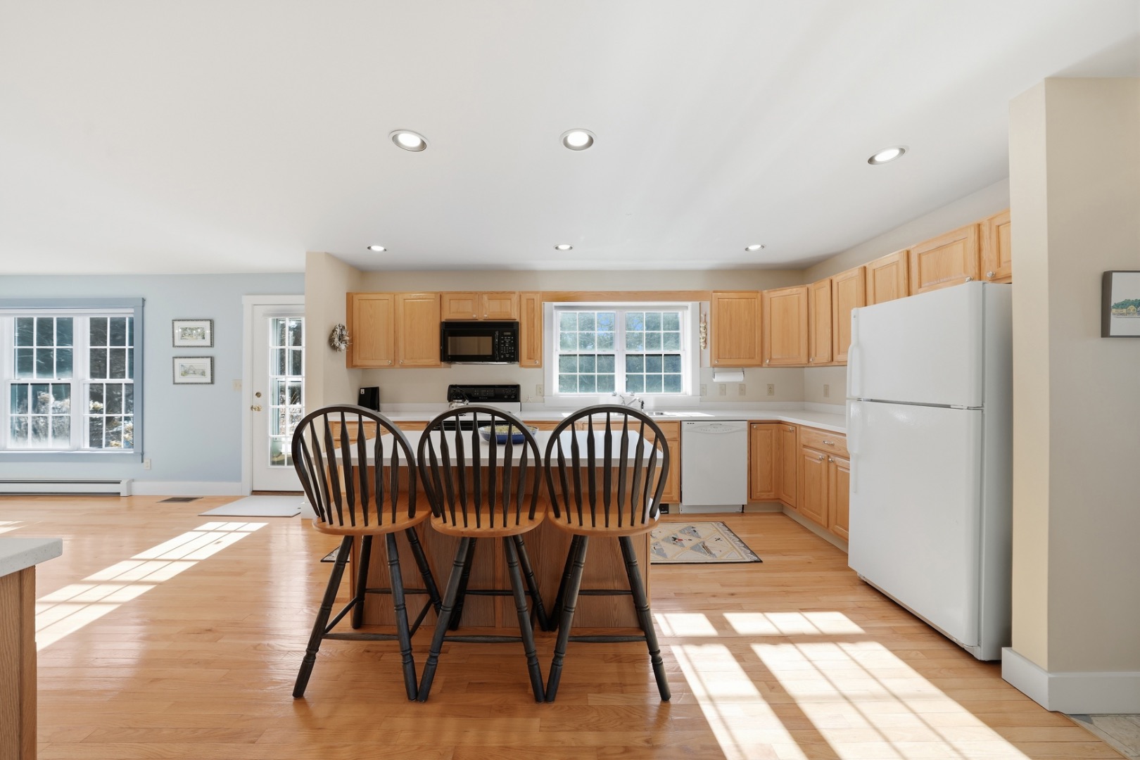 20 Rudder Lane Nantucket, MA 02554 - Photo 14 of 34 a view of a dining room with furniture window and wooden floor