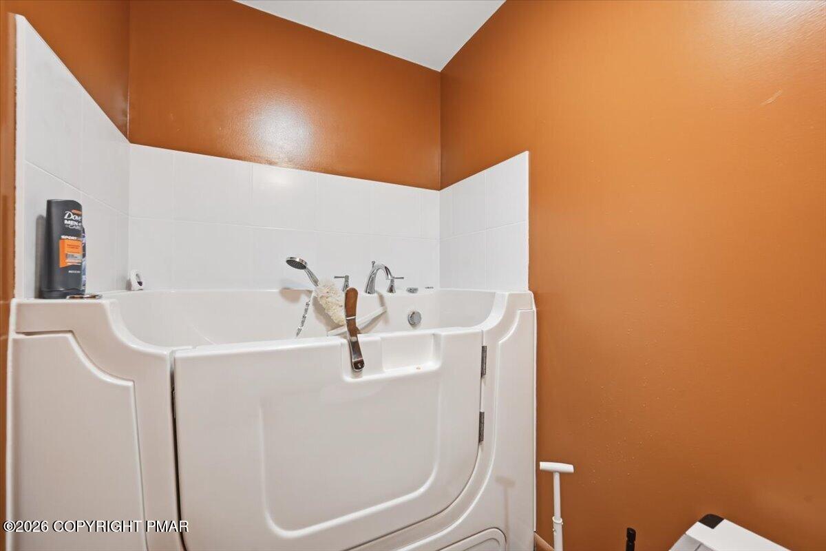 345 Laurel Lake Road Bartonsville, PA 18321 - Photo 35 of 82 a bathroom with a sink and mirror