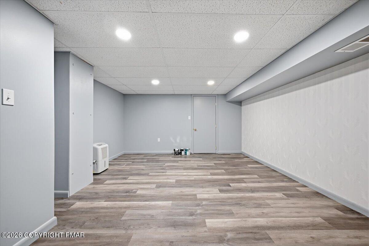 345 Laurel Lake Road Bartonsville, PA 18321 - Photo 39 of 82 a view of empty room with wooden floor
