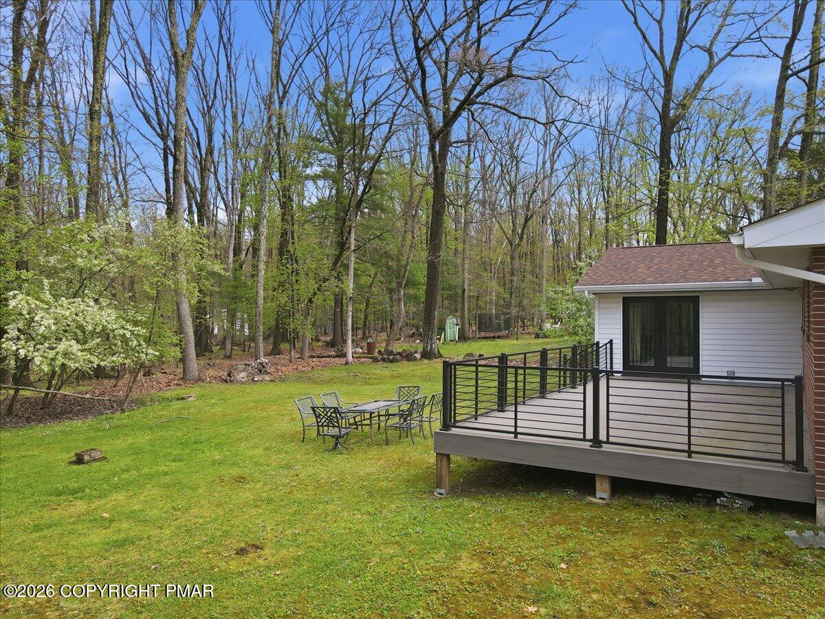 345 Laurel Lake Road Bartonsville, PA 18321 - Photo 67 of 82 a view of a house with a yard
