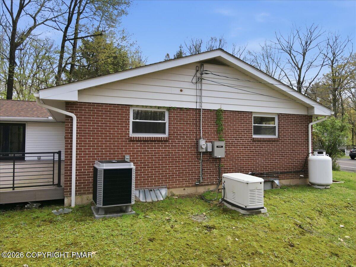 345 Laurel Lake Road Bartonsville, PA 18321 - Photo 74 of 82 a front view of a house with garden
