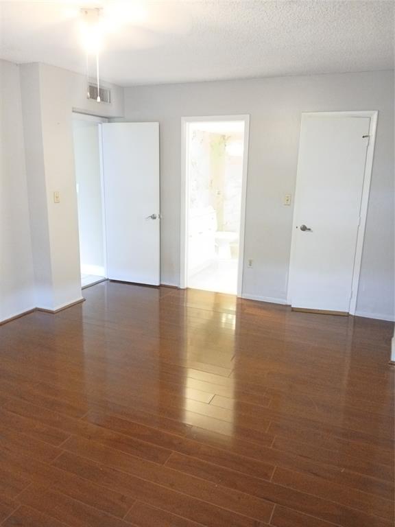 4170 Inverrary Drive, Unit 412 Lauderhill, FL 33319 - Photo 13 of 15 a view of empty room with wooden floor and fan