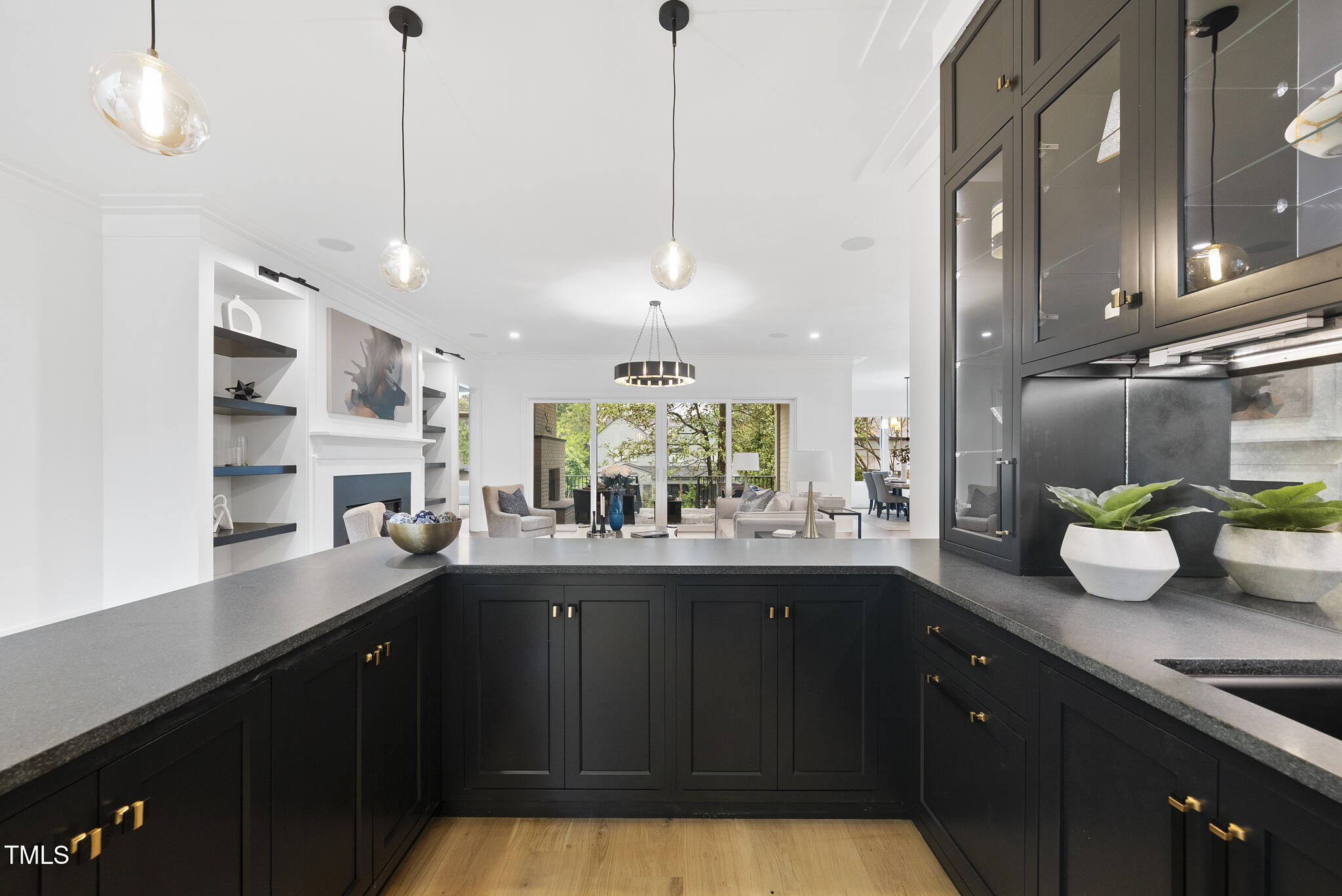 3407 Churchill Road Raleigh, NC 27607 - Photo 13 of 44 a kitchen with sink cabinets and window