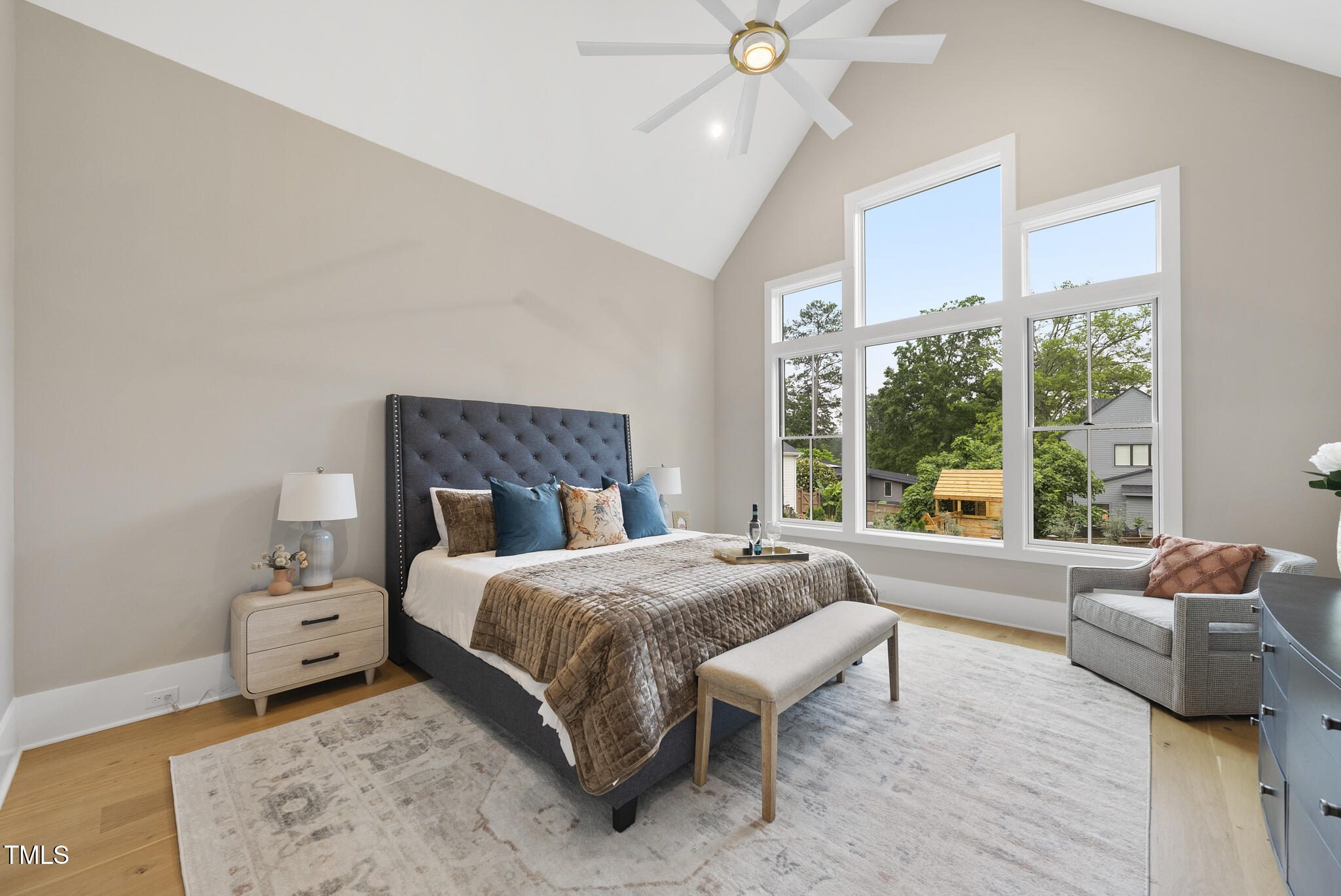 3407 Churchill Road Raleigh, NC 27607 - Photo 15 of 44 a bedroom with a bed and a couch