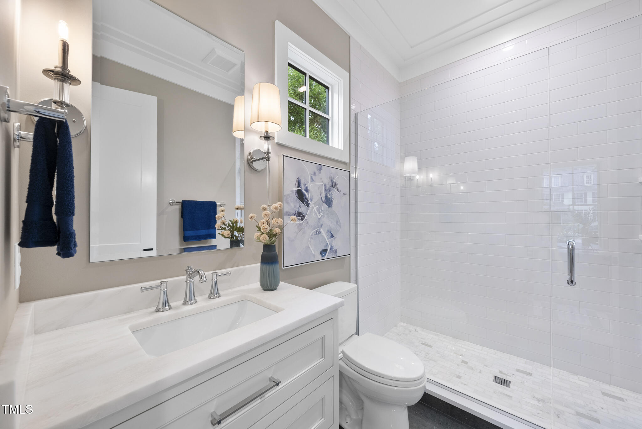 3407 Churchill Road Raleigh, NC 27607 - Photo 22 of 44 a bathroom with a granite countertop sink toilet and shower