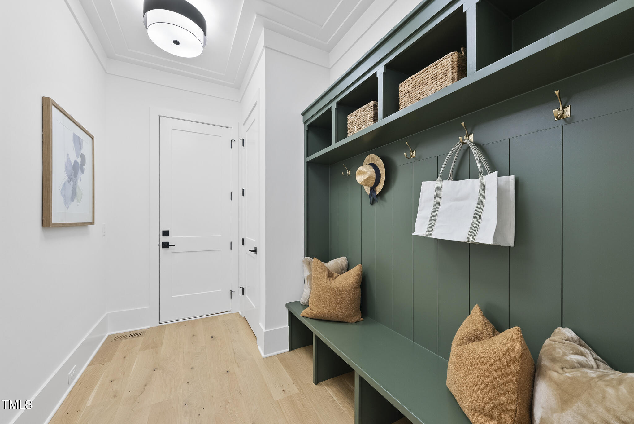 3407 Churchill Road Raleigh, NC 27607 - Photo 35 of 44 a bedroom with a bed and a lamp on the table