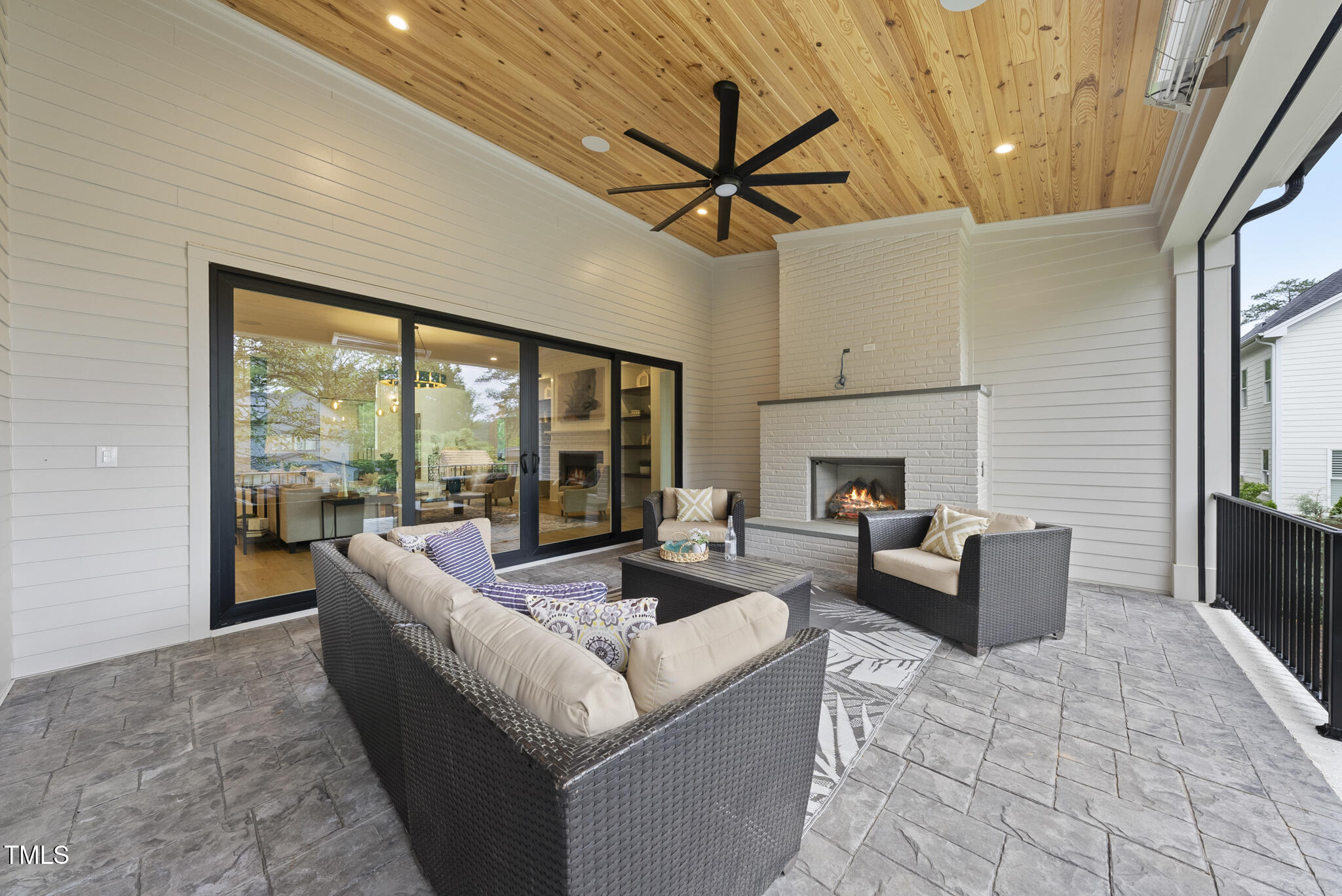 3407 Churchill Road Raleigh, NC 27607 - Photo 37 of 44 a living room with furniture and a fireplace