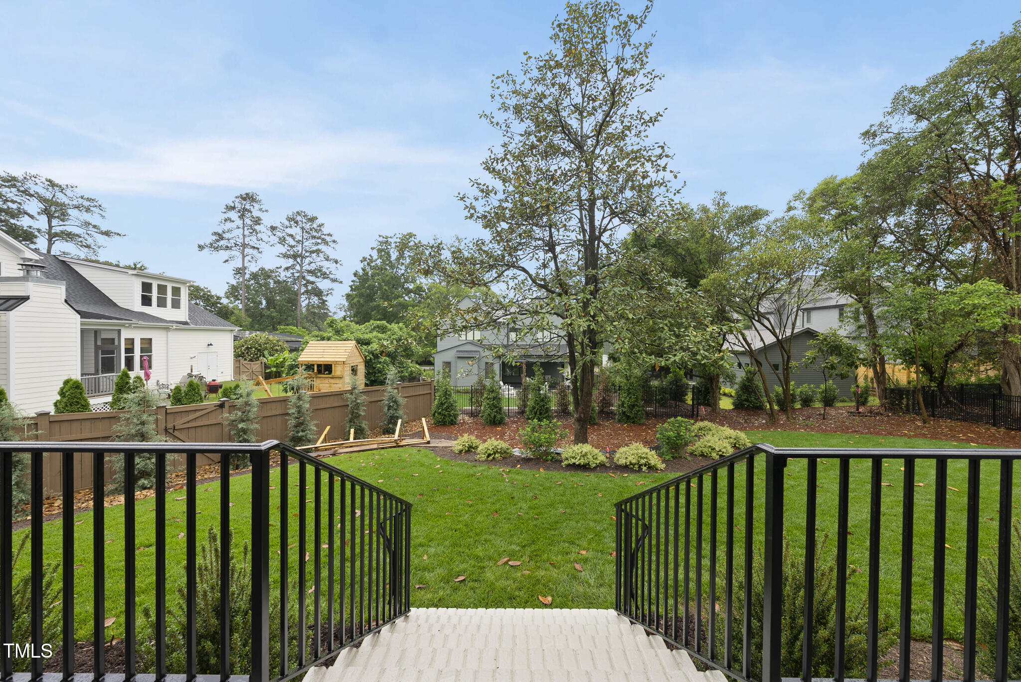 3407 Churchill Road Raleigh, NC 27607 - Photo 41 of 44 a view of a house with backyard and deck
