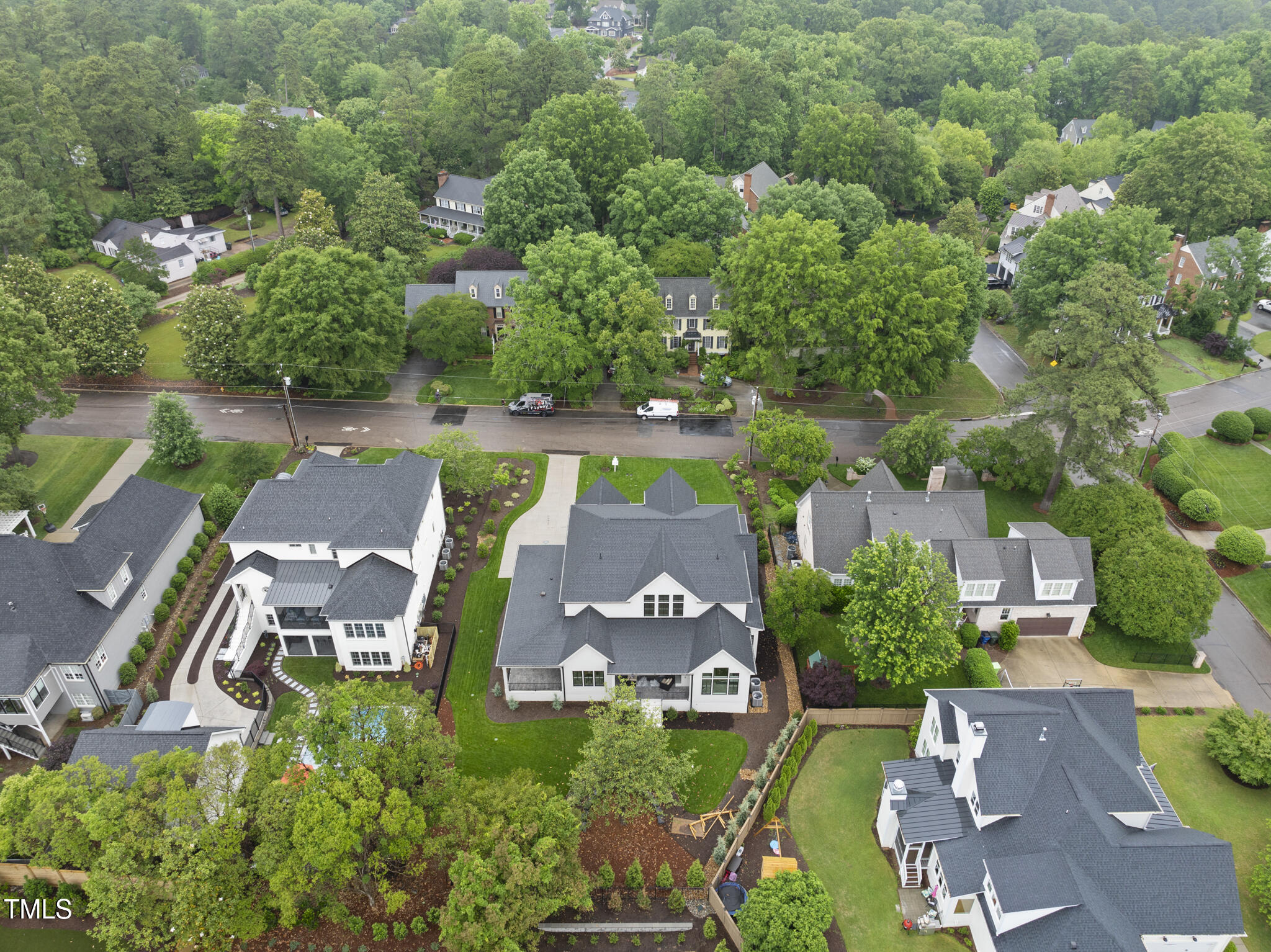 3407 Churchill Road Raleigh, NC 27607 - Photo 44 of 44 an aerial view of residential houses with outdoor space and street view