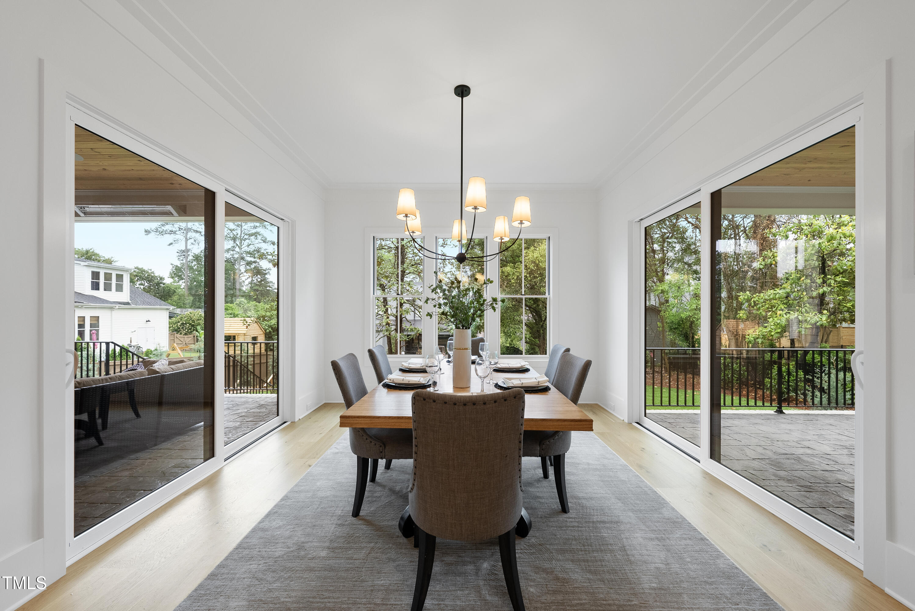 3407 Churchill Road Raleigh, NC 27607 - Photo 7 of 44 a dining room with furniture window and outside view