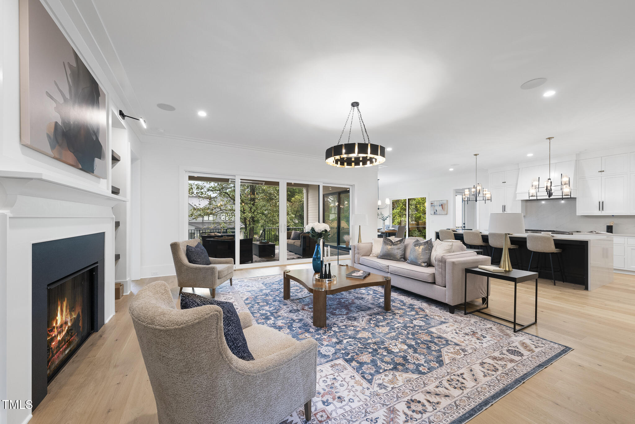 3407 Churchill Road Raleigh, NC 27607 - Photo 9 of 44 a view of a livingroom with furniture window and wooden floor