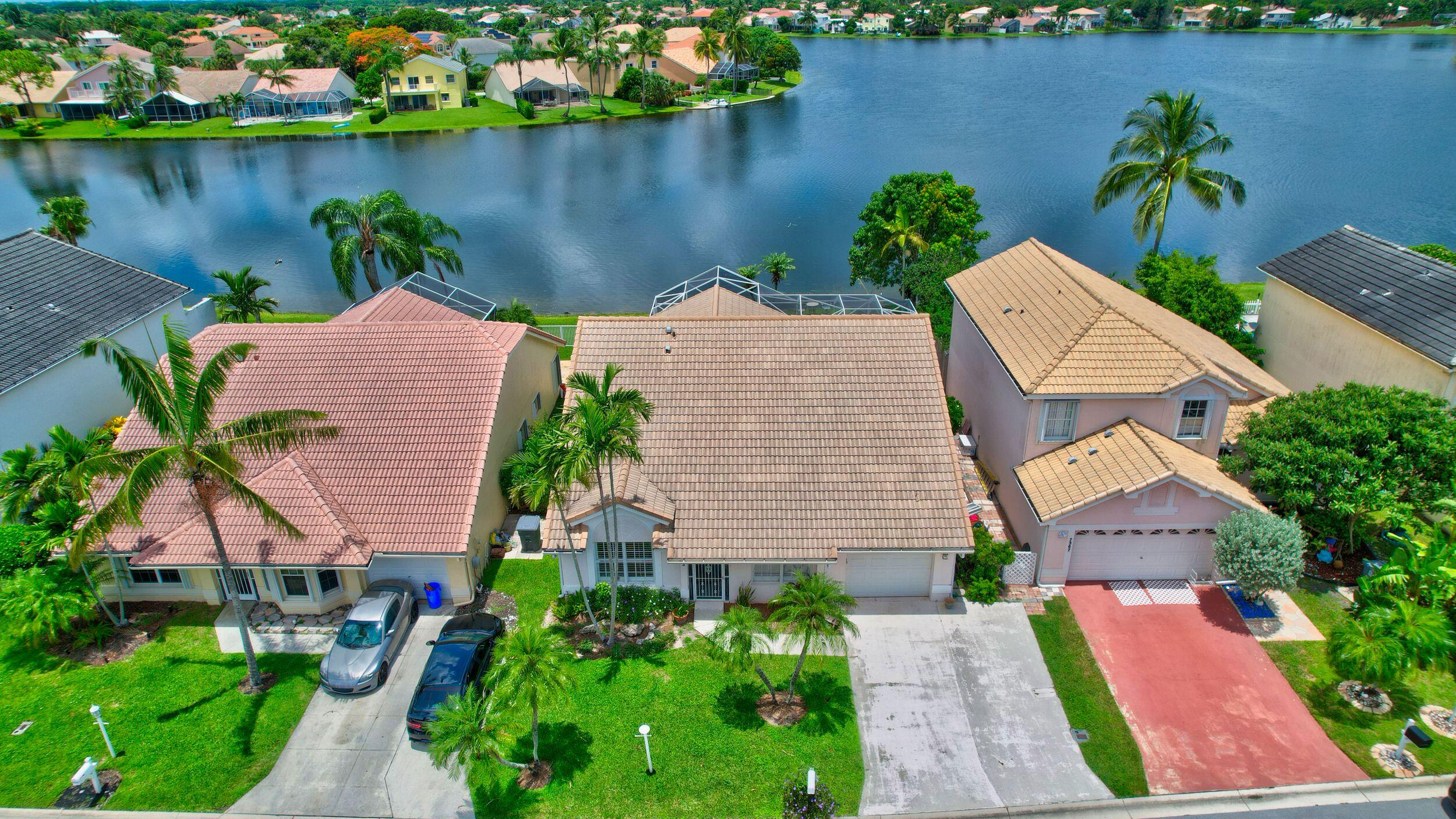 7373 Shell Ridge Terrace Lake Worth, FL 33467 - Photo 2 of 30 02_dji_10001 (98)_99)_100)_101)_102)