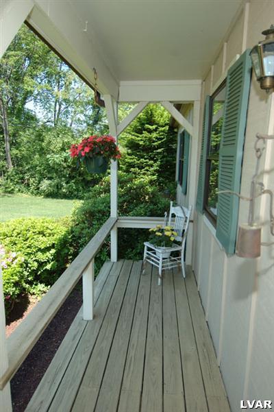 6347 Durham Road Riegelsville, PA 18077 - Photo 10 of 10 a view of balcony with chairs and wooden floor
