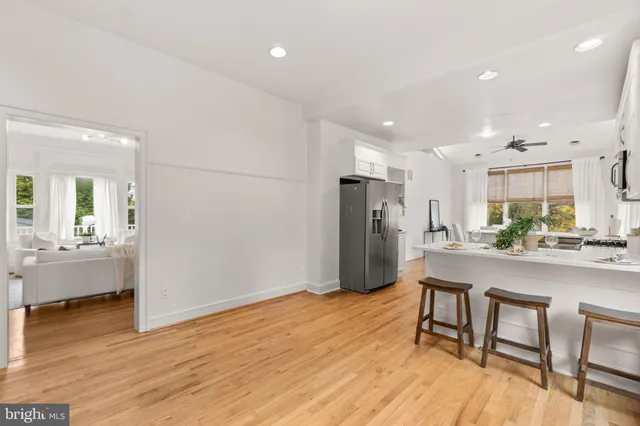 a kitchen with stainless steel appliances granite countertop a stove and cabinets
