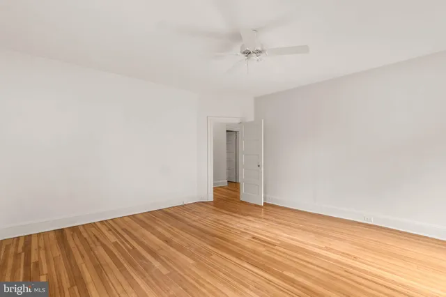 a view of a patio with a table and chairs