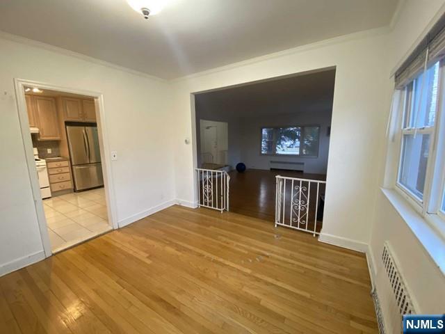 1374 Anderson Avenue, Unit 1 Fort Lee, NJ 07024 - Photo 3 of 5 a view of a livingroom with a fireplace