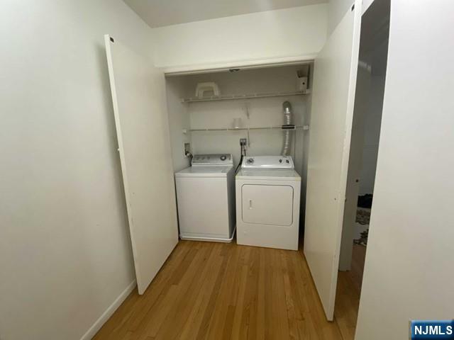 1374 Anderson Avenue, Unit 1 Fort Lee, NJ 07024 - Photo 5 of 5 a utility room with sink dryer and washer
