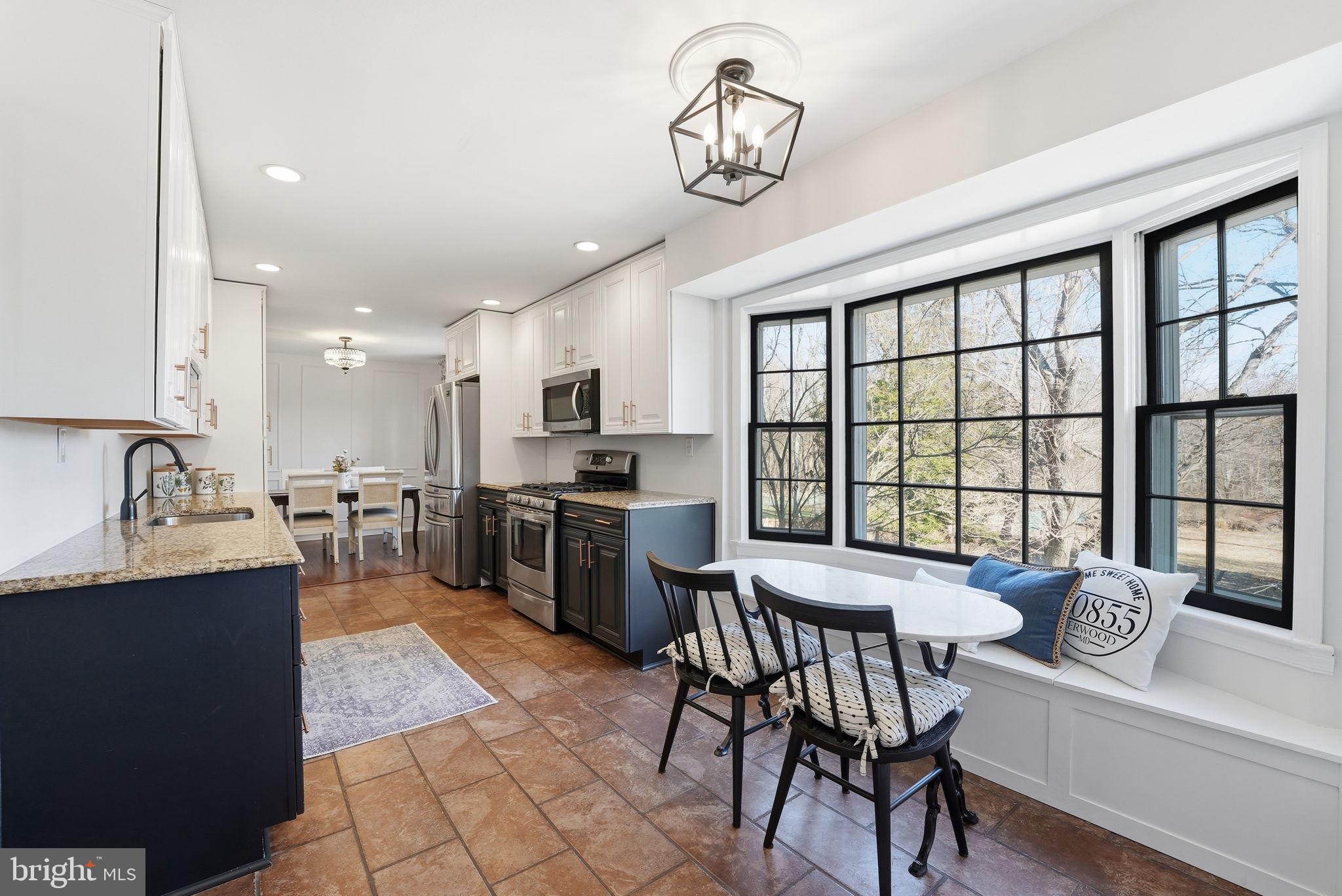 16905 Briardale Road Derwood, MD 20855 - Photo 12 of 45 Open Walkthrough Kitchen with Breakfast Nook