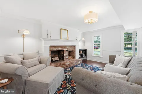 a bedroom with a large bed and a dresser