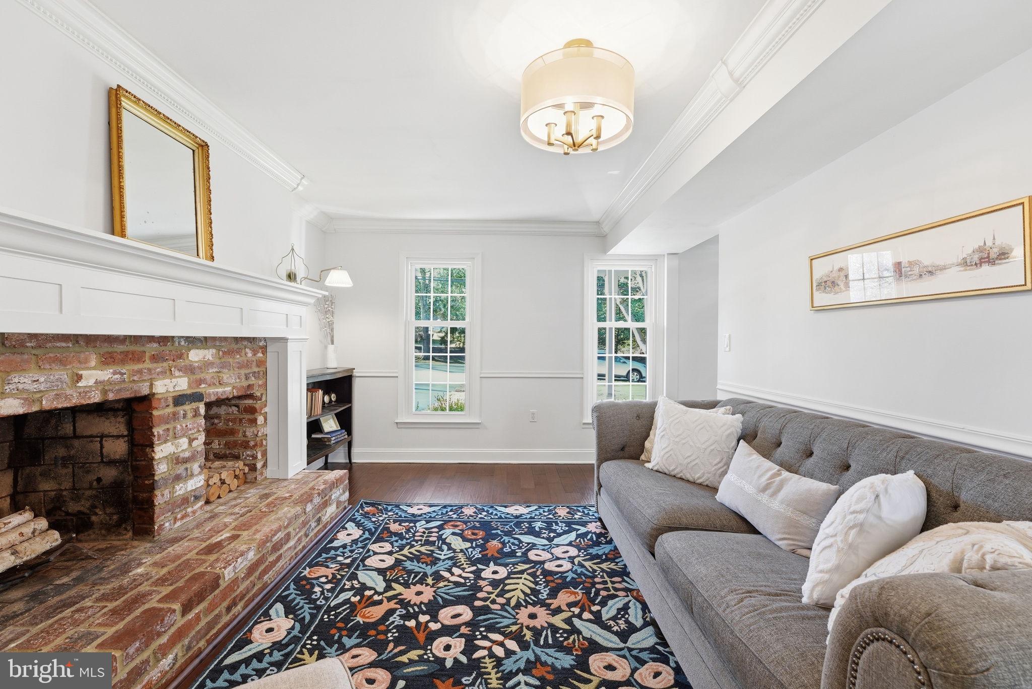 16905 Briardale Road Derwood, MD 20855 - Photo 15 of 45 Lounge Room with Brick Fireplace