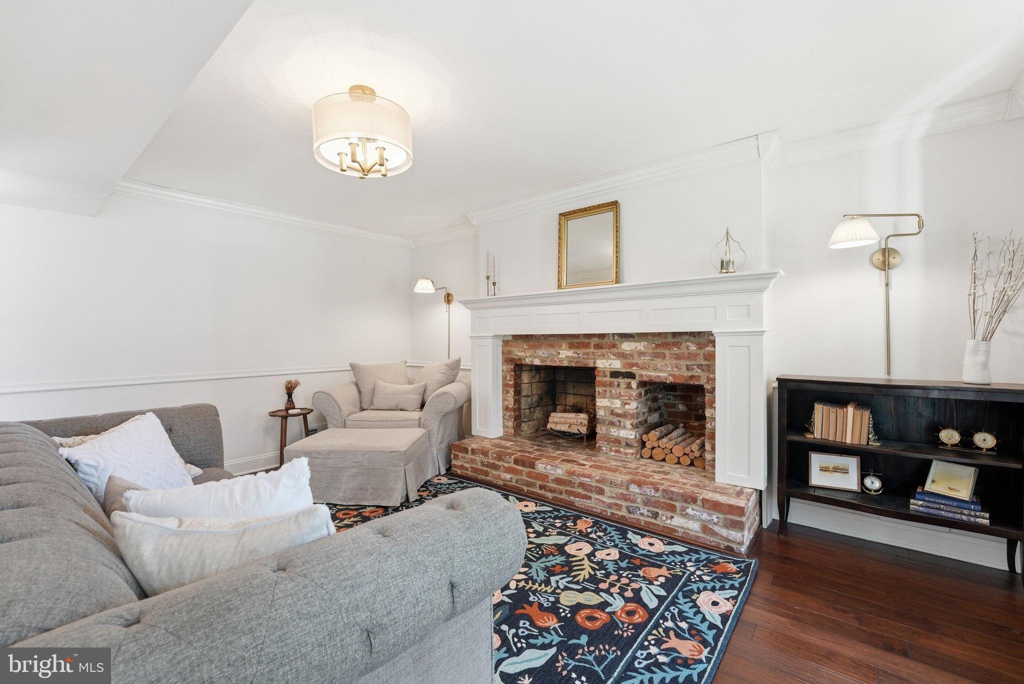16905 Briardale Road Derwood, MD 20855 - Photo 16 of 45 Lounge Room with Brick Fireplace