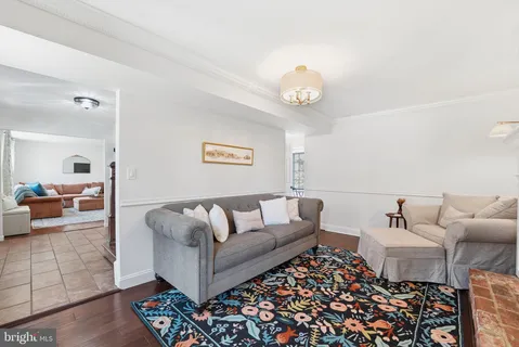 a bedroom with a bed and a table