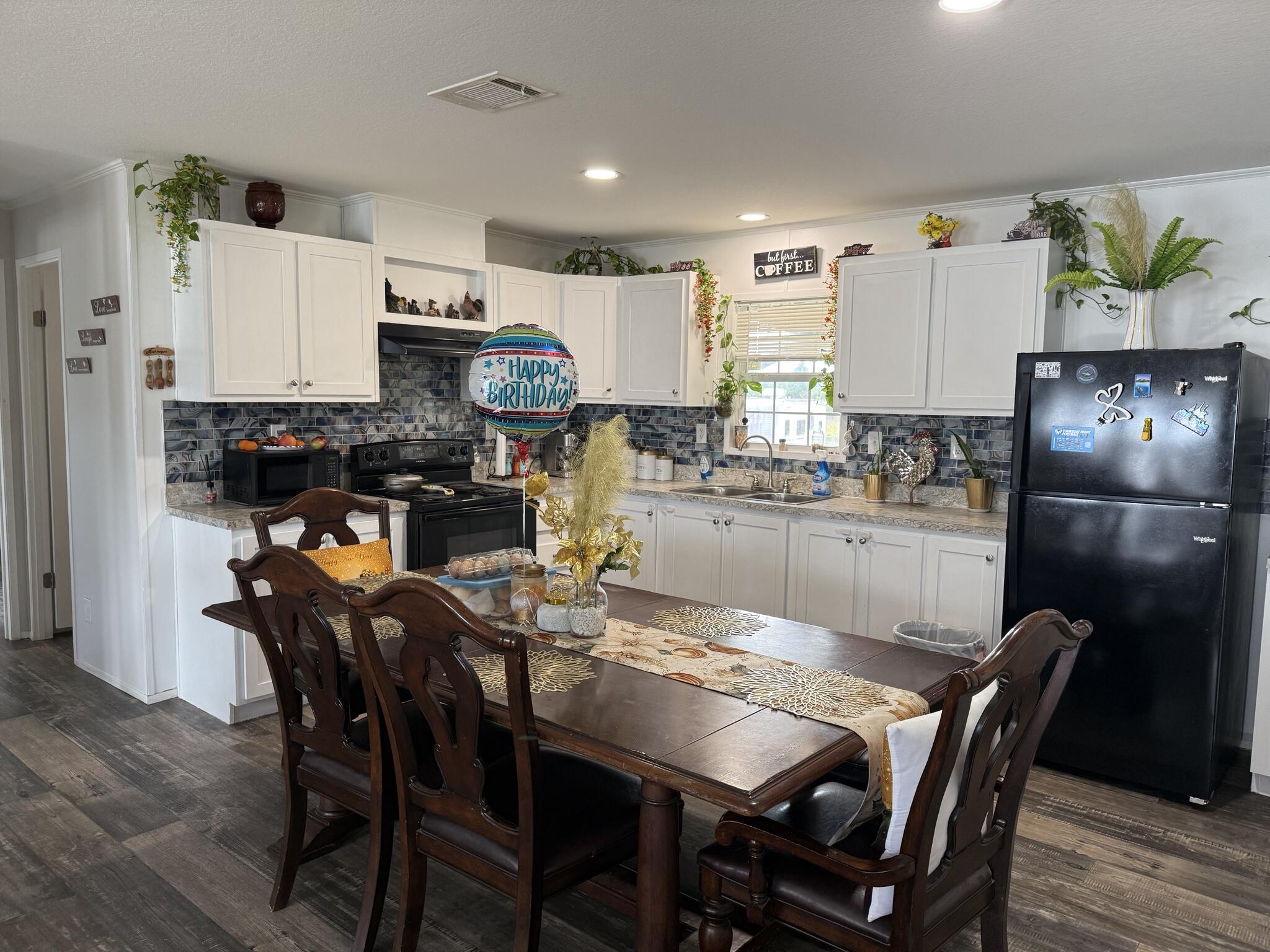 15628 Northwest 310th Street Okeechobee, FL 34972 - Photo 3 of 38 a view of a dining room with furniture