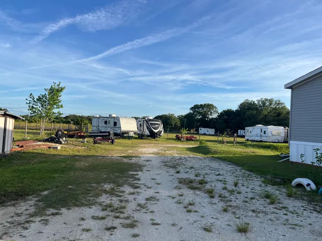 a view of a lake with a big yard