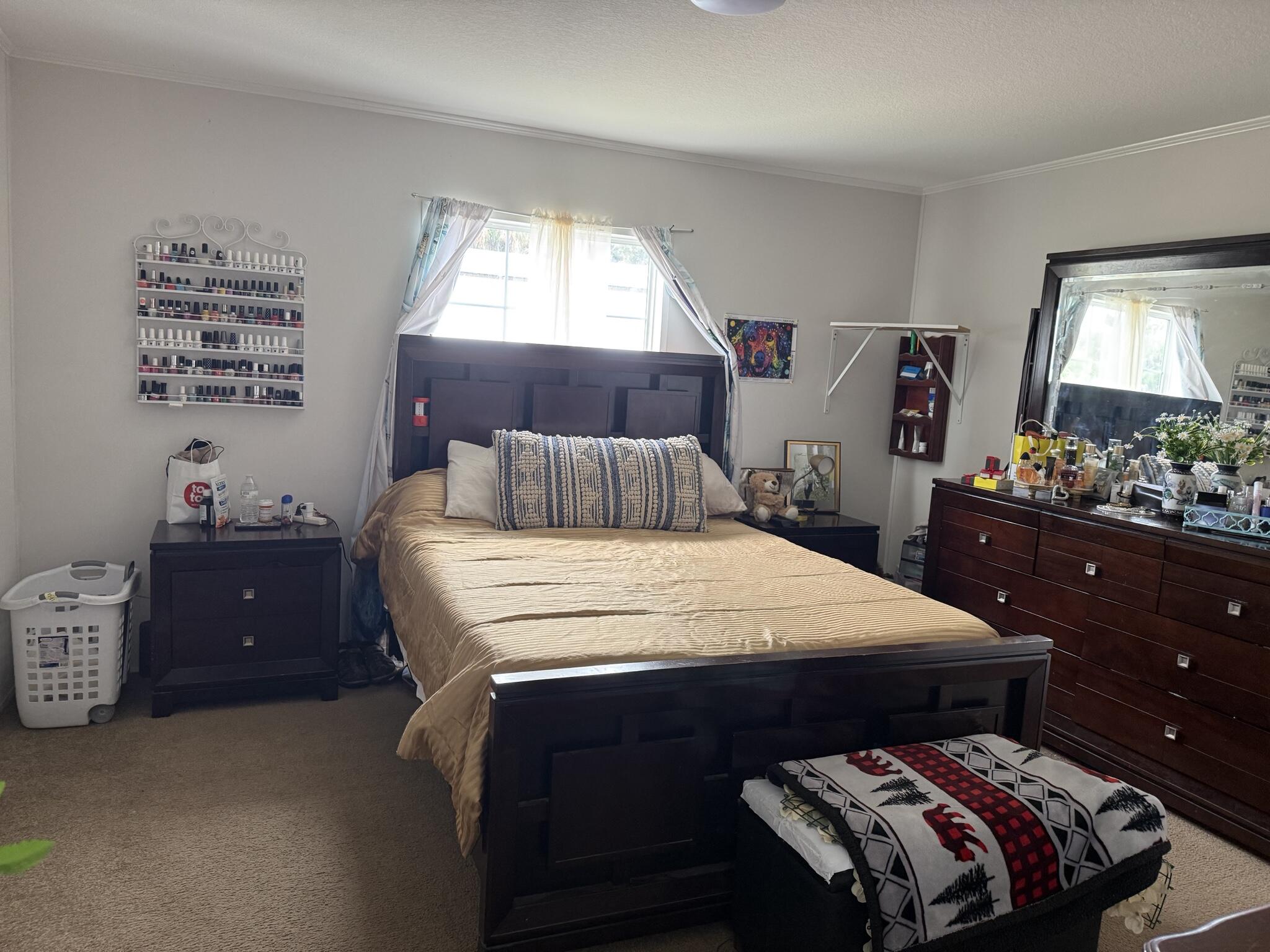 15628 Northwest 310th Street Okeechobee, FL 34972 - Photo 6 of 38 a bedroom with a bed and a window