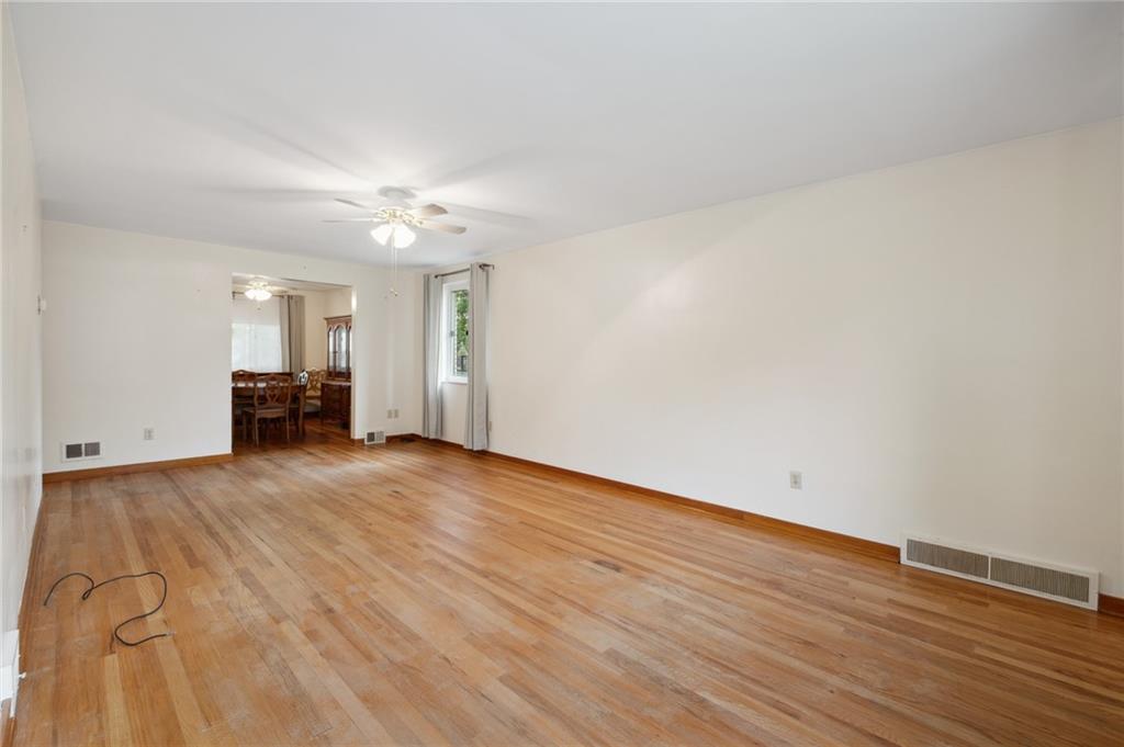 826 Rosalind Road Pittsburgh, PA 15237 - Photo 6 of 24 The Living Room Is Also Open To The Dining Room ~ Perfect For Entertaining.