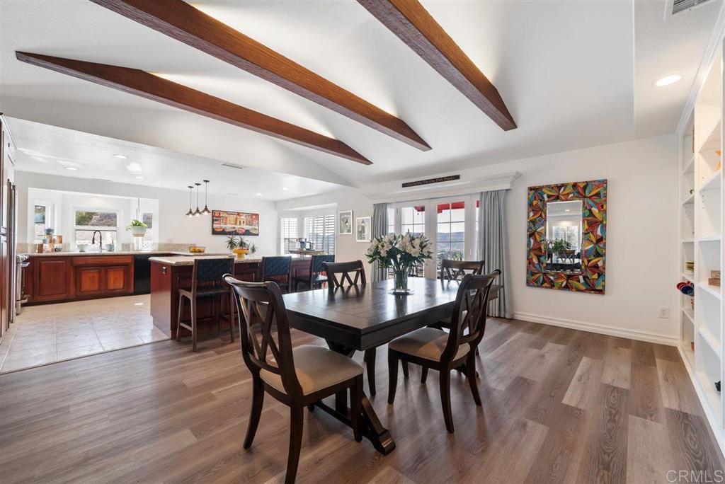 16416 Wikiup Road Ramona, CA 92065 - Photo 11 of 26 a view of a dining room with furniture and wooden floor