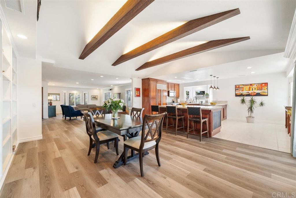 16416 Wikiup Road Ramona, CA 92065 - Photo 12 of 26 a dining room with furniture and wooden floor