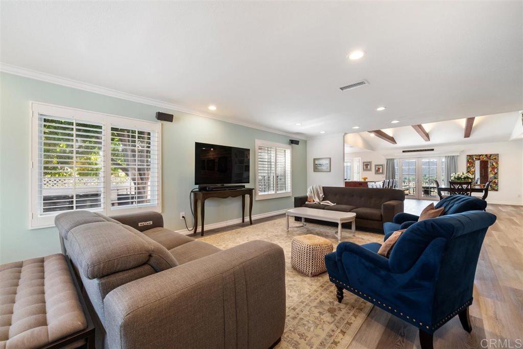 16416 Wikiup Road Ramona, CA 92065 - Photo 14 of 26 a living room with furniture and a flat screen tv