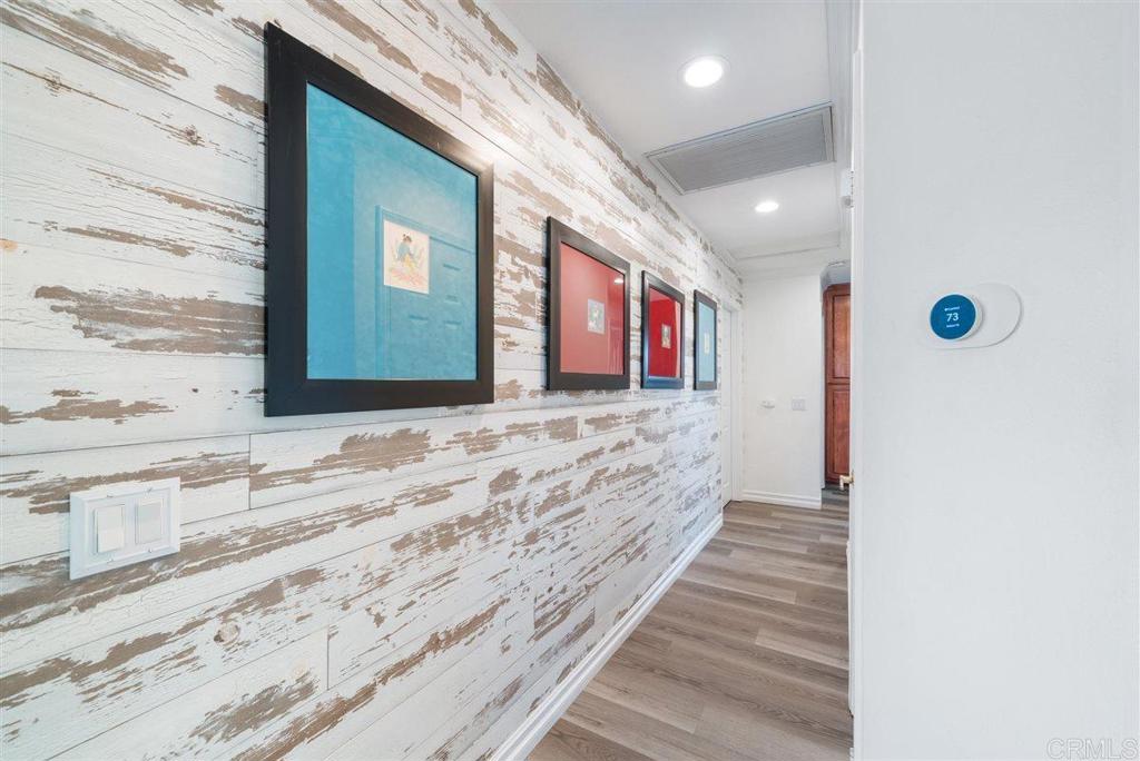 16416 Wikiup Road Ramona, CA 92065 - Photo 15 of 26 a view of a hallway with wooden floor and staircase