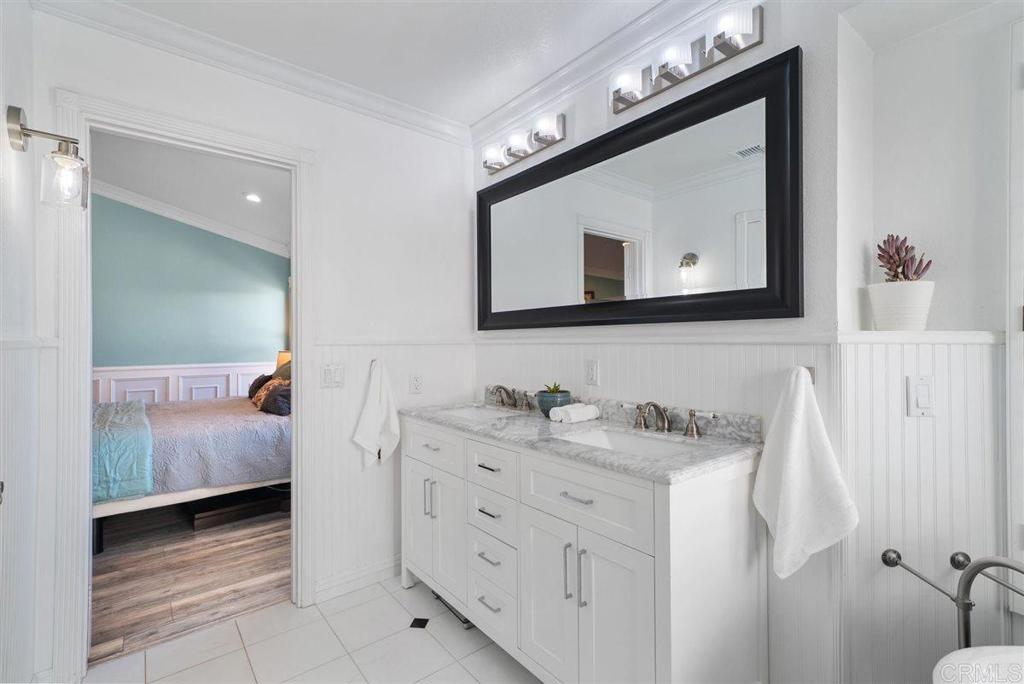 16416 Wikiup Road Ramona, CA 92065 - Photo 17 of 26 a bathroom with a sink vanity and mirror