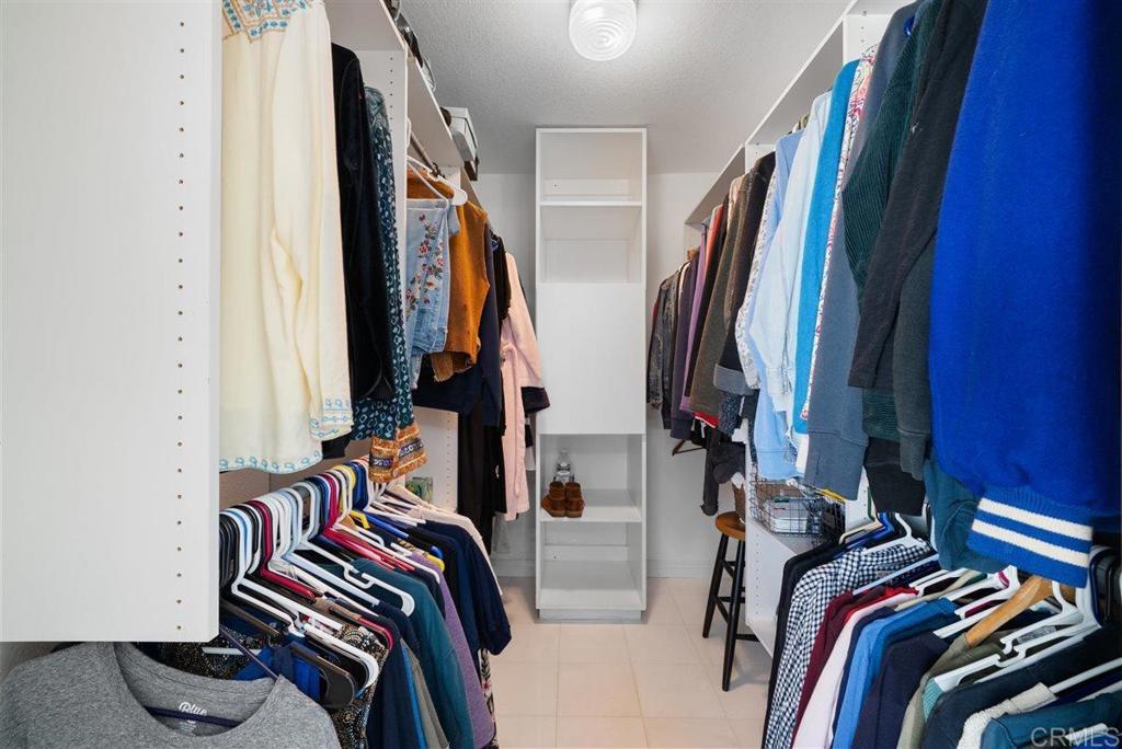16416 Wikiup Road Ramona, CA 92065 - Photo 20 of 26 a view of walk in closet with clothes