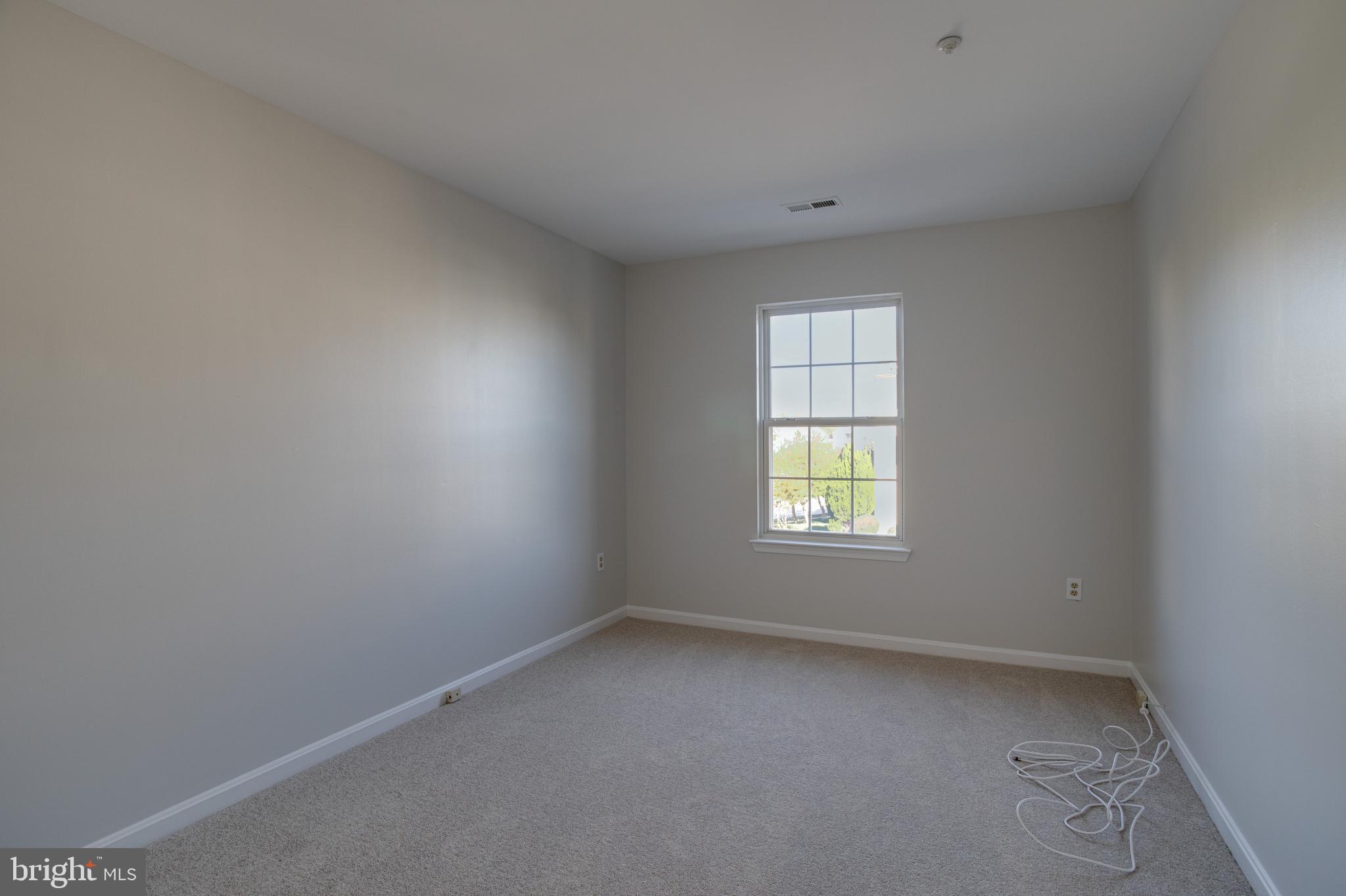 329 Assembly Point Court Odenton, MD 21113 - Photo 11 of 22 Bedroom 1 with NEW wall to wall carpeting!
