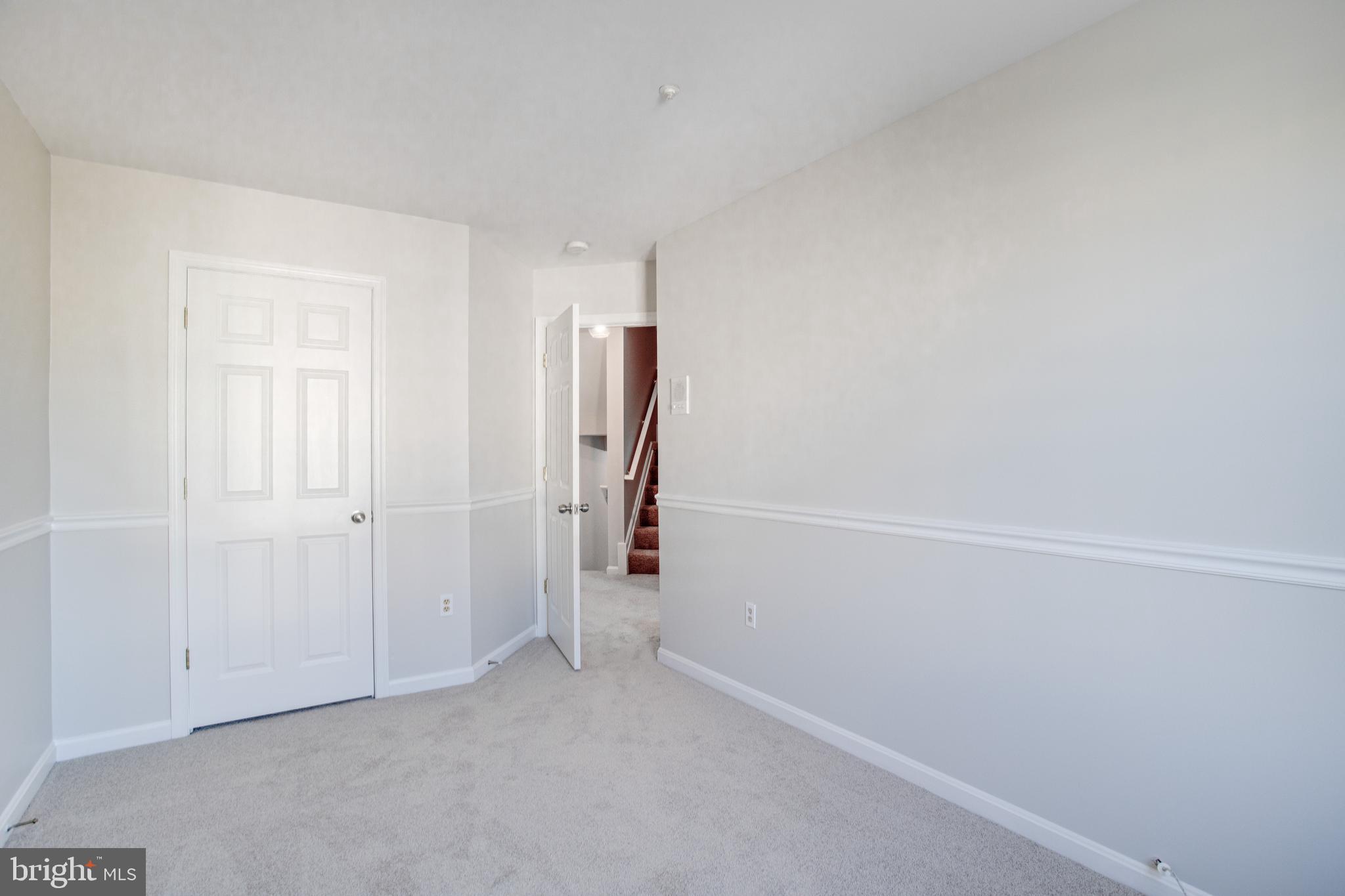 329 Assembly Point Court Odenton, MD 21113 - Photo 13 of 22 Bedroom 2 with NEW wall to wall carpeting!