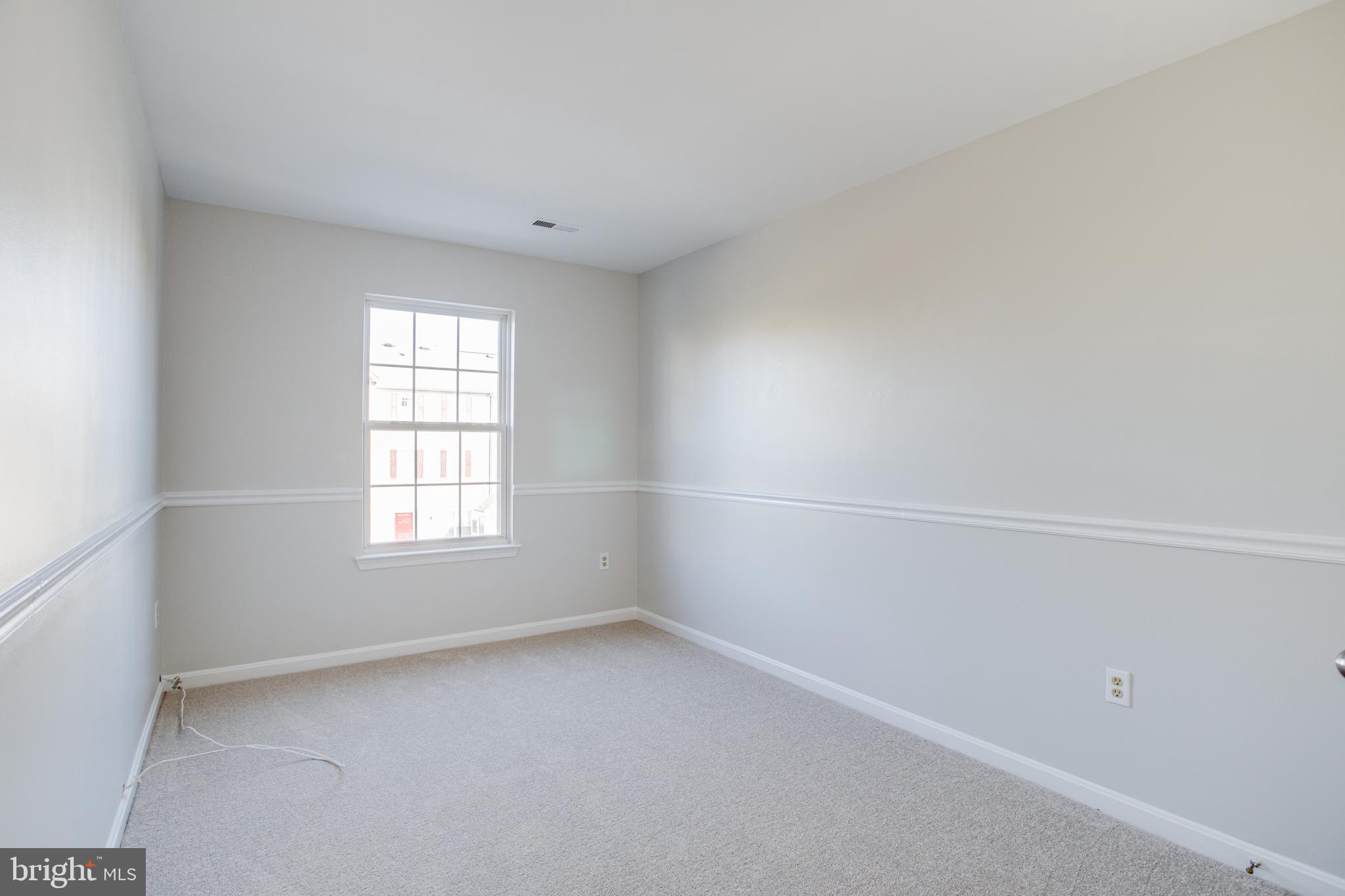 329 Assembly Point Court Odenton, MD 21113 - Photo 14 of 22 Bedroom 2 with NEW wall to wall carpeting!